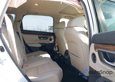 2017 Honda Cr-V Touring z USA, uszkodzony, nr VIN 2HKRW1H9XHH515567